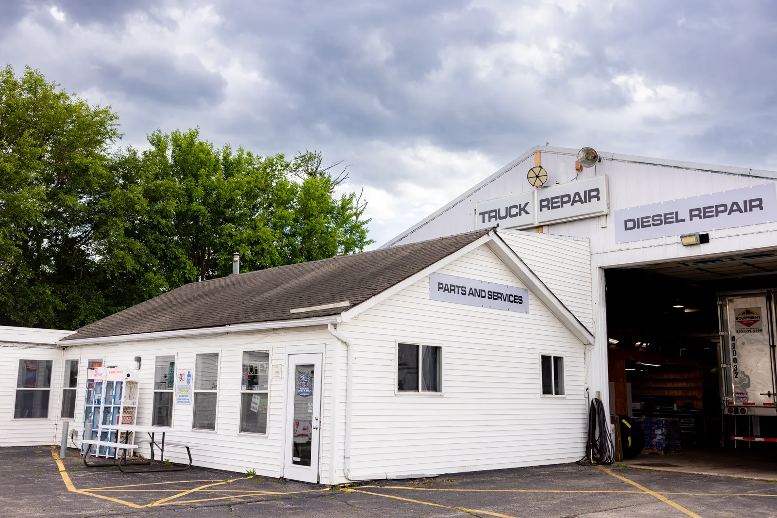 Truck Shark shop front with truck repair and diesel repair signs