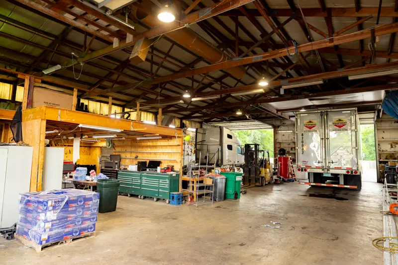 Truck Shark service bay in Long Grove with trucks on the floor
